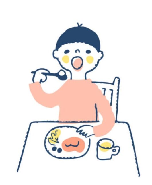 朝食を食べる男の子